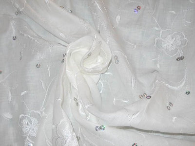 White embroidered linen with sequence 54&quot; wide~Design 1&quot;