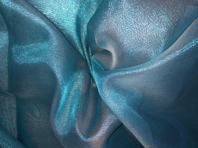 Tissue fabric 44" wide available in 14 colors copper, bright gold ,subtle gold ,neon pink ,neon green ,neon blue ,dark gold, blue x pink , white gold, blue with a hint of pink, pinkish mauve, gold x black ,copper x gold ,SILVER