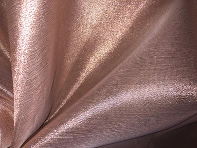 Tissue fabric 44" wide available in 14 colors copper, bright gold ,subtle gold ,neon pink ,neon green ,neon blue ,dark gold, blue x pink , white gold, blue with a hint of pink, pinkish mauve, gold x black ,copper x gold ,SILVER