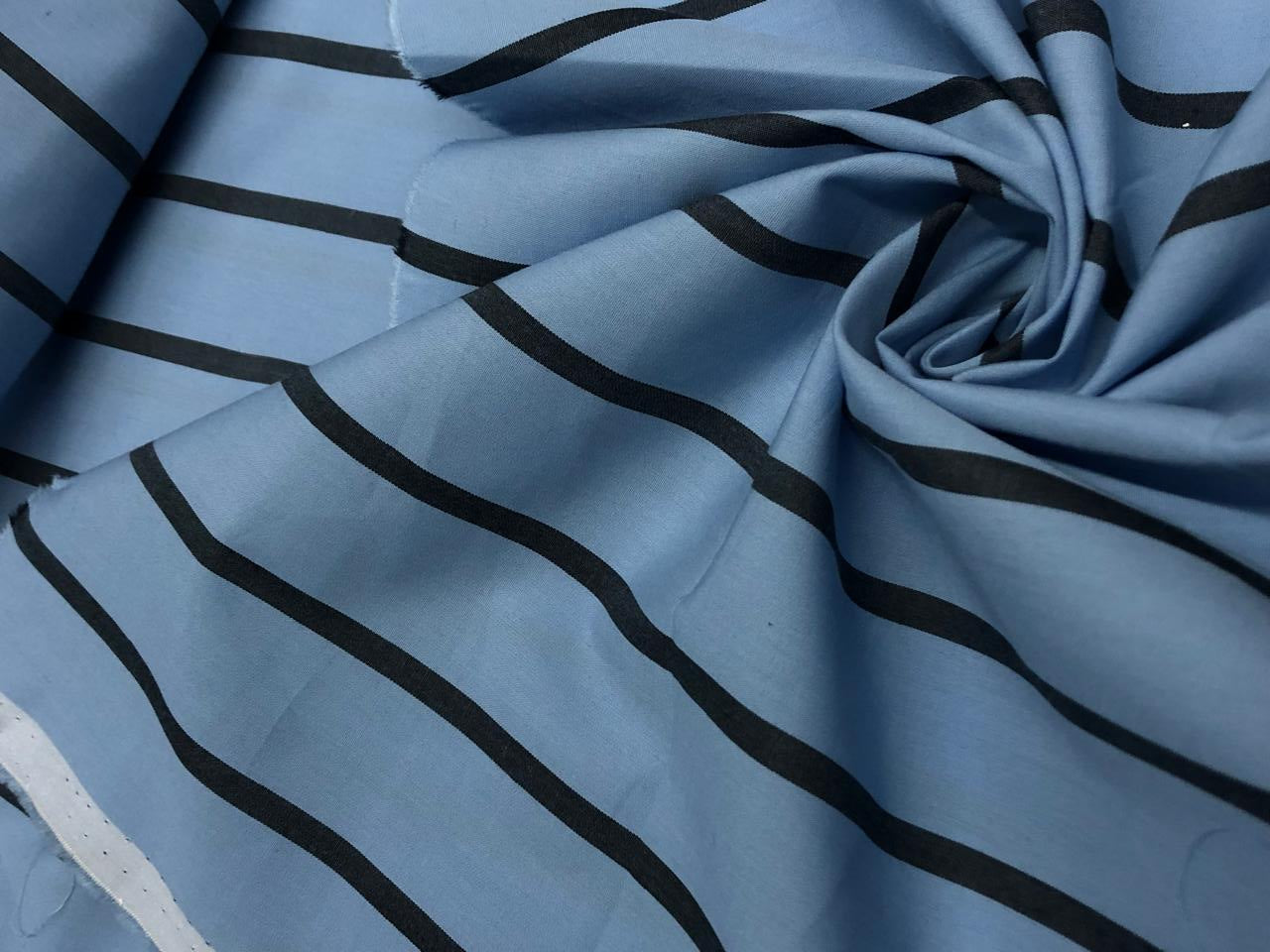 100% Cotton 58" wide available in 3 different blues pastel blue/white , navy/red/white , and blue/navy