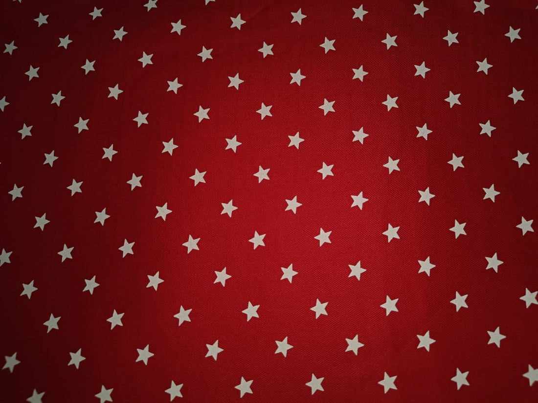 100% Cotton  Twill fabric red with ivory star motif color 58" wide
