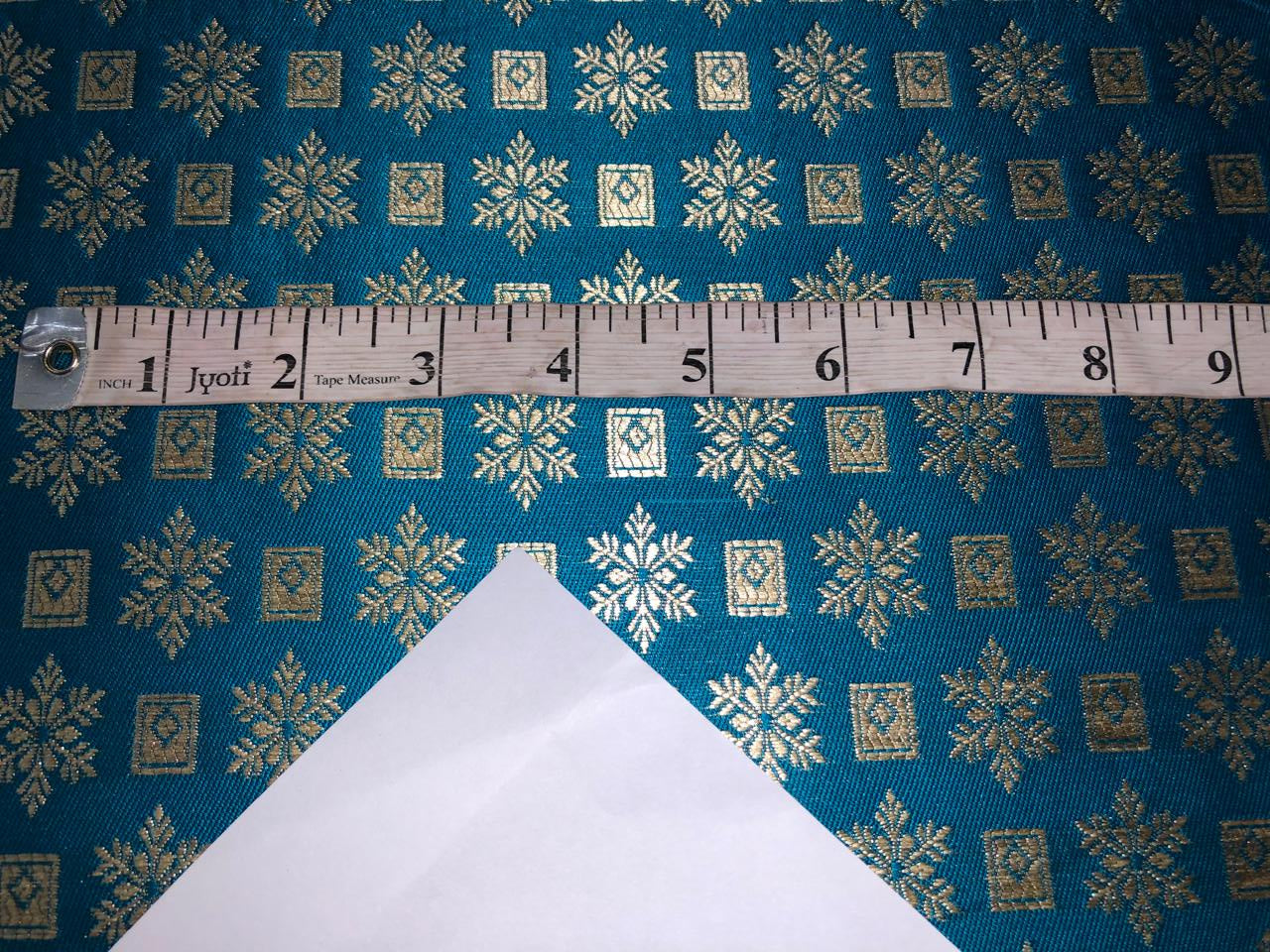 Silk Brocade fabric with MOTIF WHITE GOLD jacquard  available in 2 colors  TURQUOISE BLUE AND TEAL BRO1015