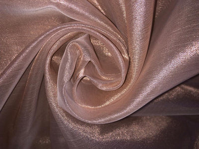 Tissue fabric 44" wide available in 14 colors copper, bright gold ,subtle gold ,neon pink ,neon green ,neon blue ,dark gold, blue x pink , white gold, blue with a hint of pink, pinkish mauve, gold x black ,copper x gold ,SILVER