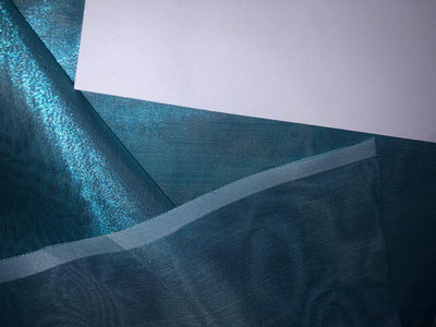 Tissue fabric 44" wide available in 14 colors copper, bright gold ,subtle gold ,neon pink ,neon green ,neon blue ,dark gold, blue x pink , white gold, blue with a hint of pink, pinkish mauve, gold x black ,copper x gold ,SILVER