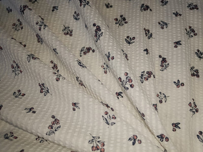 100% Cotton  Seer Sucker fabric white with floral motif color 58" wide