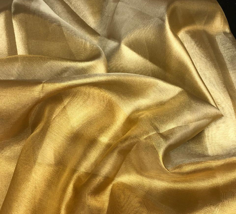 Cotton Tissue  sheer 44" wide 22" of each color half and half available in 2 colors blue/teal and gold/gold[ [18354/55]