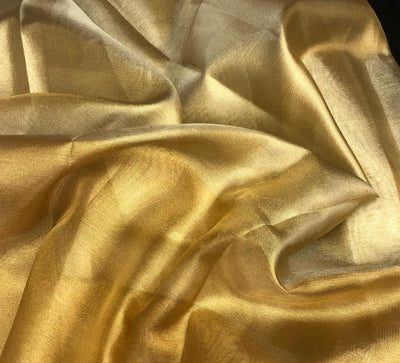 Cotton Tissue  sheer 44" wide 22" of each color half and half available in 2 colors blue/teal and gold/gold[ [18354/55]