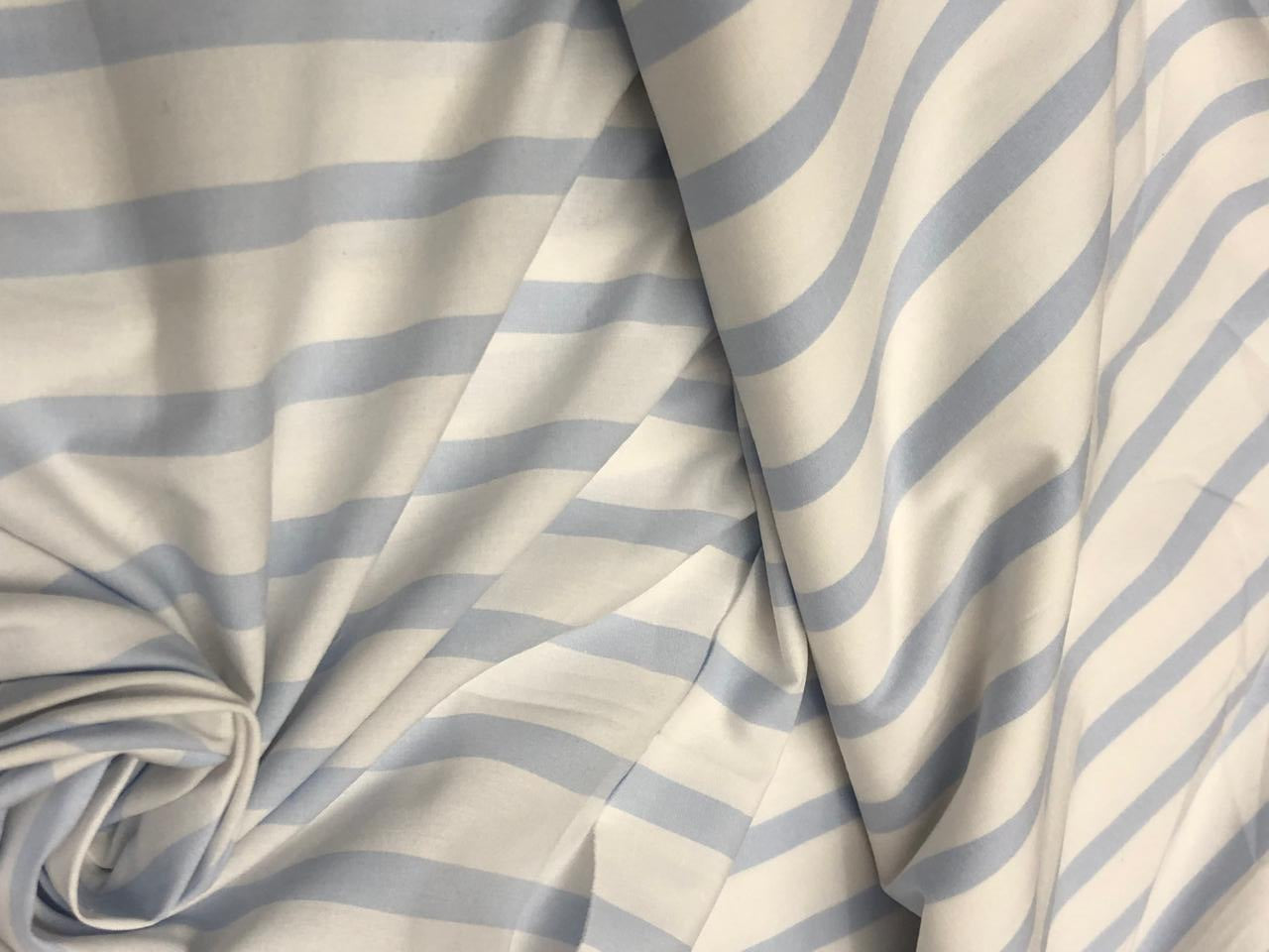 100% Cotton 58" wide available in 3 different blues pastel blue/white , navy/red/white , and blue/navy