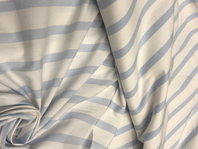 100% Cotton 58" wide available in 3 different blues pastel blue/white , navy/red/white , and blue/navy