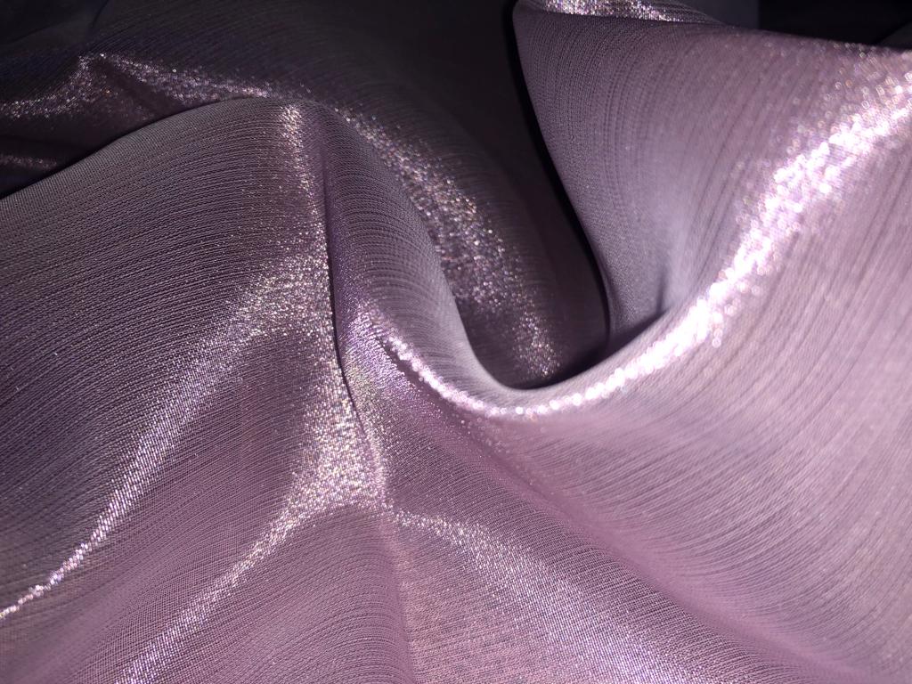 Tissue fabric 44" wide available in 14 colors copper, bright gold ,subtle gold ,neon pink ,neon green ,neon blue ,dark gold, blue x pink , white gold, blue with a hint of pink, pinkish mauve, gold x black ,copper x gold ,SILVER