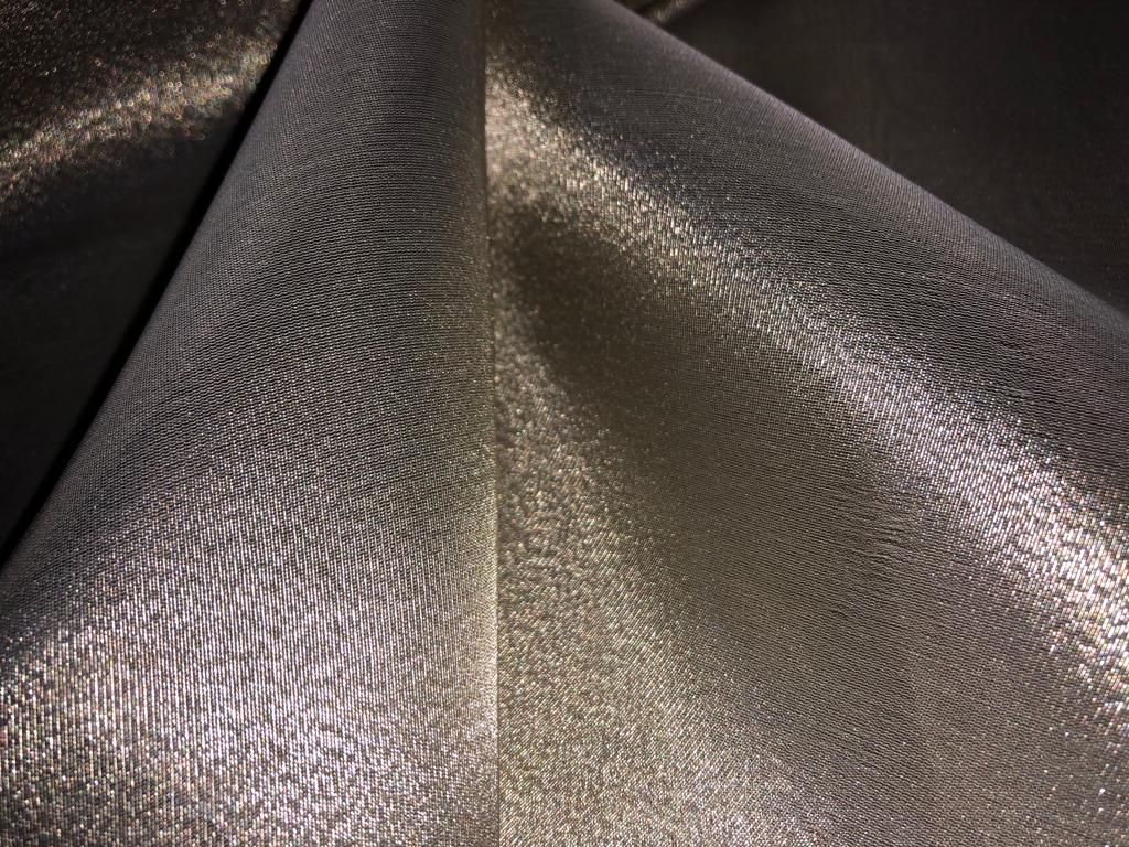 Tissue fabric 44" wide available in 14 colors copper, bright gold ,subtle gold ,neon pink ,neon green ,neon blue ,dark gold, blue x pink , white gold, blue with a hint of pink, pinkish mauve, gold x black ,copper x gold ,SILVER