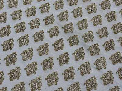 Silk Brocade fabric 44" dark ivory with antique gold jacquard motifs available in 2 designs leaf and paisley BRO1053