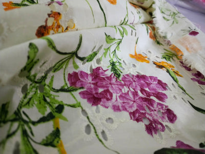 100% Cotton printed and chikan embroidery  fabric  58 inches wide 147 cms. available in 2 colors purple floral/red floral