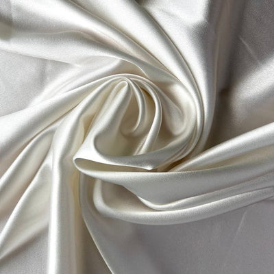 100% Charmeuse Silk Satin fabric available in 26 and 40 momme white ivory color 44" wide