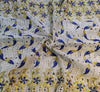 100 % Cotton fabric embroidered ~ with cut work ivory blue and metallic gold 36&quot; wide.