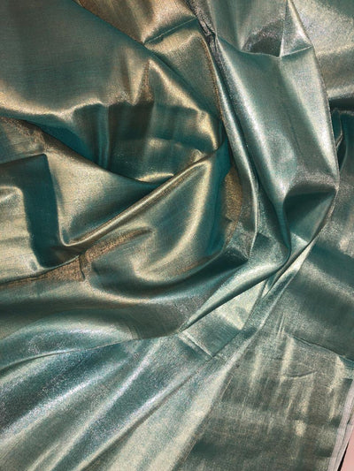 Cotton Tissue  sheer 44" wide 22" of each color half and half available in 2 colors blue/teal and gold/gold[ [18354/55]