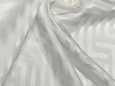 Silk  Satin JACQUARD IVORY WHITE 44" wide available in abstract,floral,roses,waves and triangles jacquard  designs