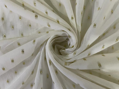 100% Cotton  fabric ivory with Metallic motif color 58" wide