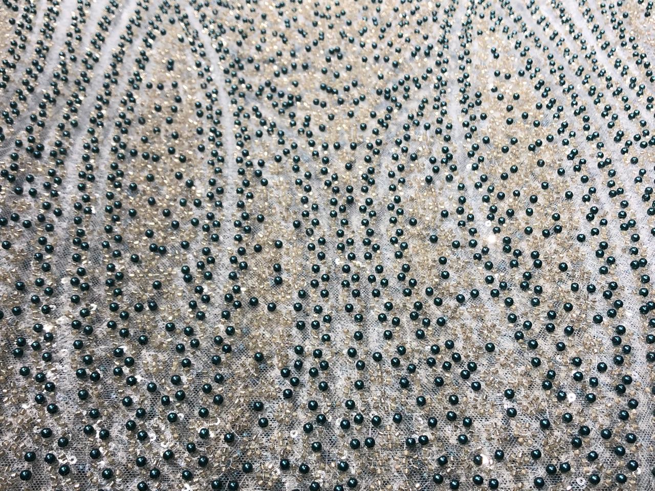 NET fabric with sequins and  pearls available in 2 colors black and white 56" wide [17807/08]