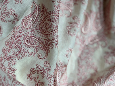 100% Linen  Kashmiri Embroidered fabric paisleys 58" wide available in 3 colors ivory with pink paisleys ,camel with navy paisley and ivory with beige paisley