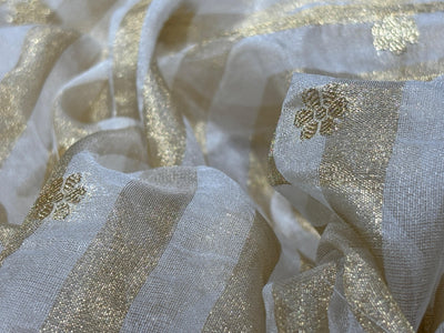Tissue fabric  ivory and gold stripe with gold dainty flowers 44" wide [17800]