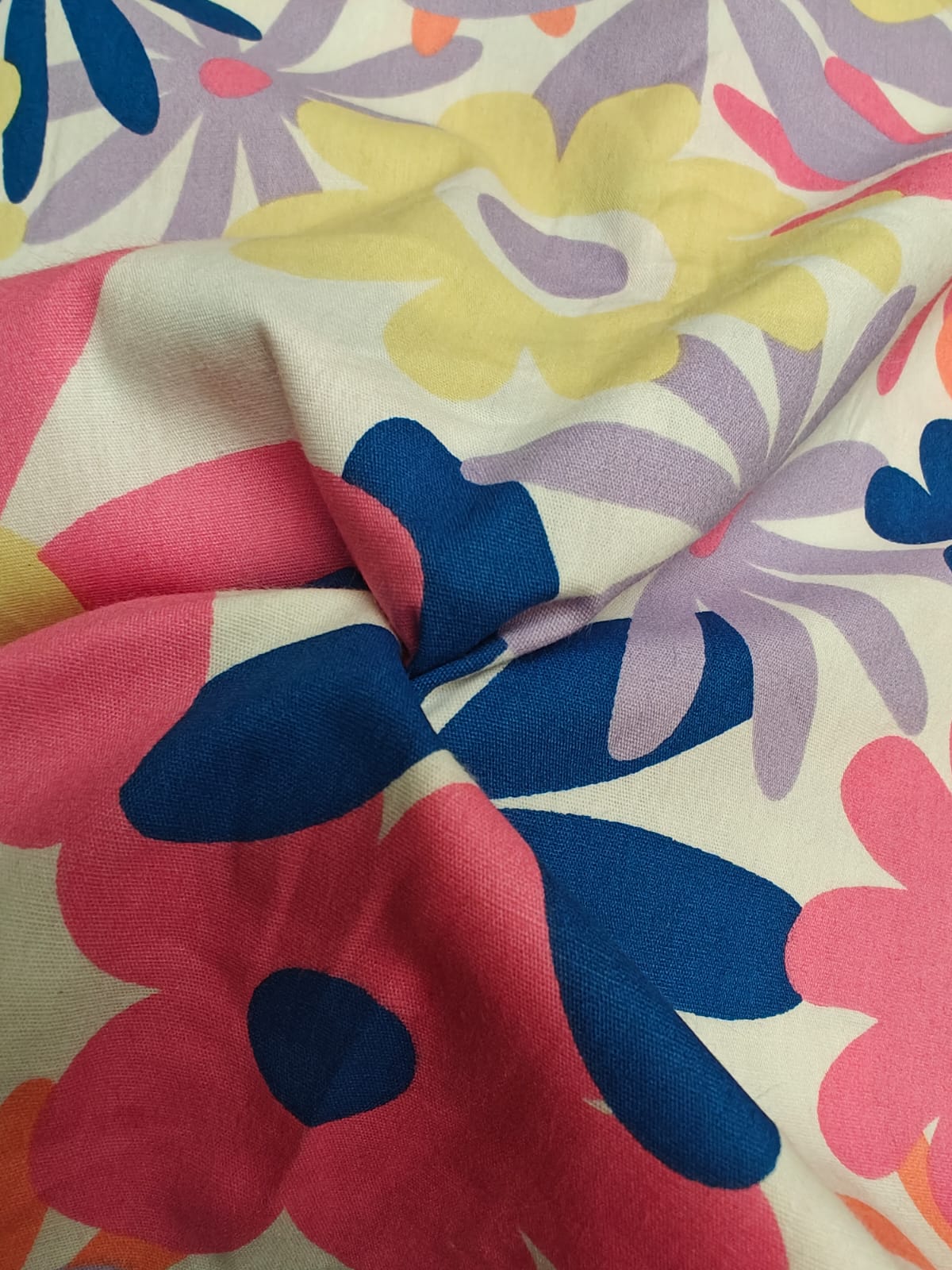 100% cotton poplin ivory color with bright flower vines 58