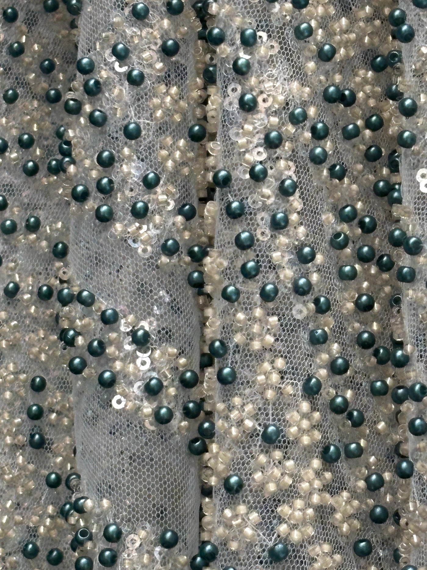 NET fabric with sequins and  pearls available in 2 colors black and white 56" wide [17807/08]