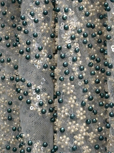 NET fabric with sequins and  pearls available in 2 colors black and white 56" wide [17807/08]