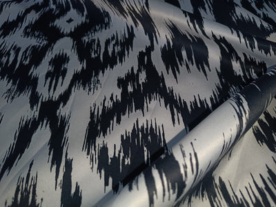 Heavy satin fabric white ivory color with black ikat print 58" wide [12950]
