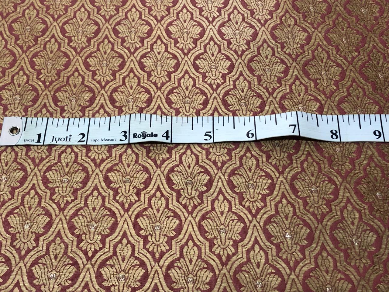 Silk Brocade fabric with subtle gold metallic jacquard motifs44" wide available in 4 colors rosy brown ,rust, bottle green and purple BRO1104