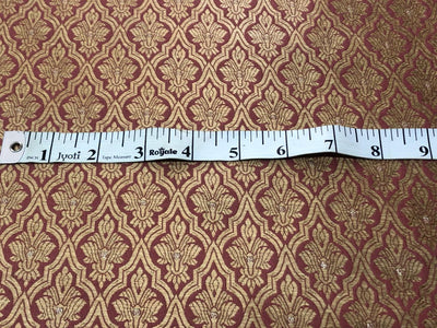 Silk Brocade fabric with subtle gold metallic jacquard motifs44" wide available in 4 colors rosy brown ,rust, bottle green and purple BRO1104