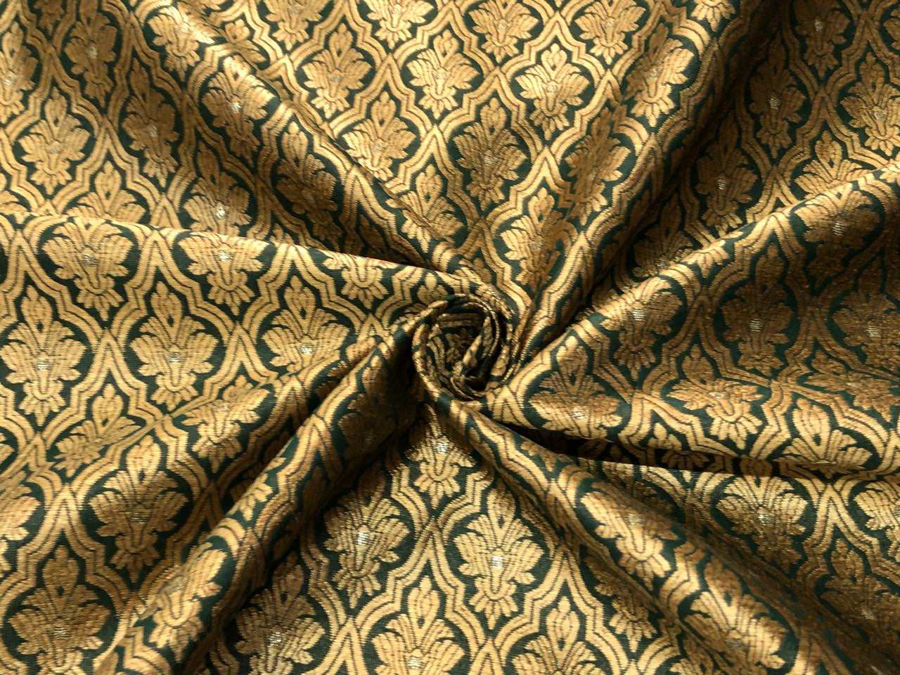 Silk Brocade fabric with subtle gold metallic jacquard motifs44" wide available in 4 colors rosy brown ,rust, bottle green and purple BRO1104