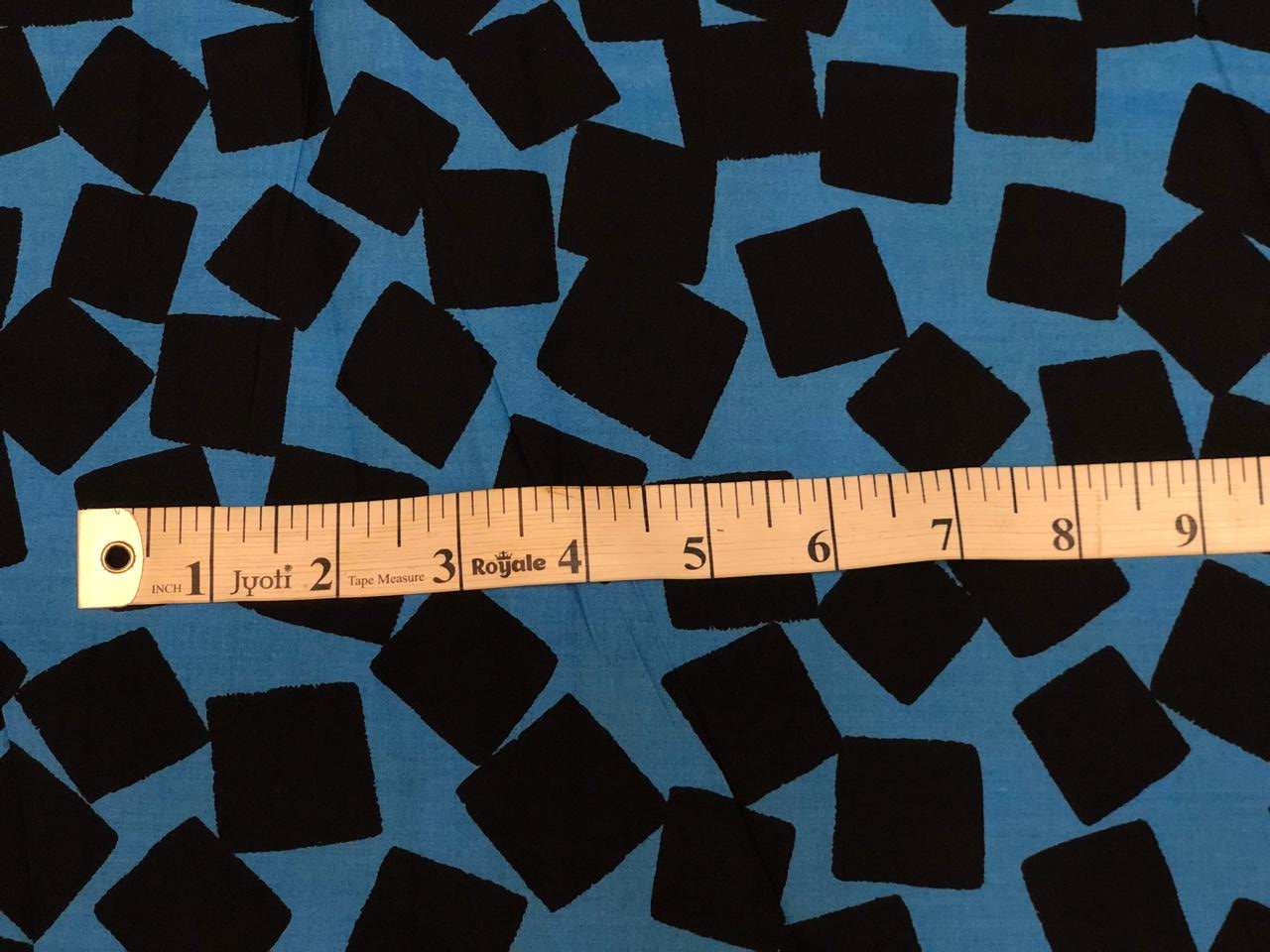 100% Cotton turquoise Blue with black geometric square print 58" wide [18622]