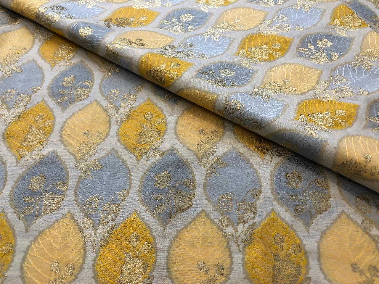 Silk Brocade fabric with colorful  leaf floral motif jacquard available in 3 colors mauve , pink peach and ivory BRO1091