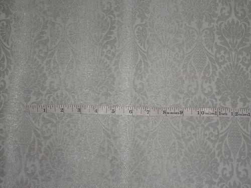 Spun Brocade fabric white w/silver motifs 44" wide BRO329[5]