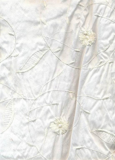 Ivory silk dupioni with Ivory self embroidery 54" wide