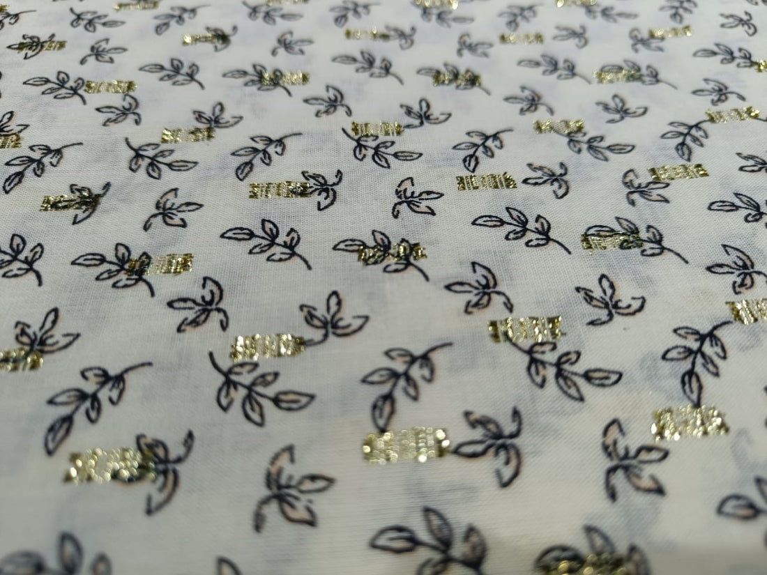 100% Cotton Print with gold metallic motif Fabric 58" wide sold by the yard.