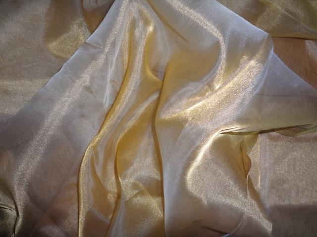 100%  Silk tissue fabric with gold 44 inches wide