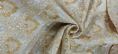 heavily embroidered ivory and gold 44&quot;