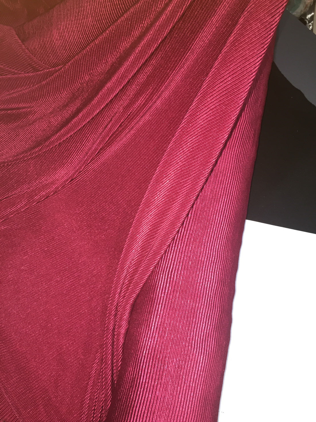 Burgundy color crushed polyester pleated satin fabric 59&quot; wide.