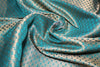 BROCADE FABRIC KINGFISHER BLUE X METALLIC GOLD MOTIF 4&quot; wide