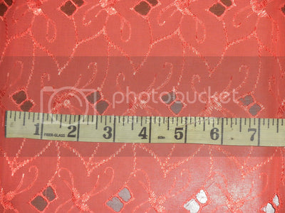 Coral color Swiss voile fabric with cut out work &amp; embroidery 54&quot;