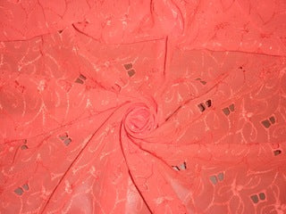 Coral color Swiss voile fabric with cut out work &amp; embroidery 54&quot;