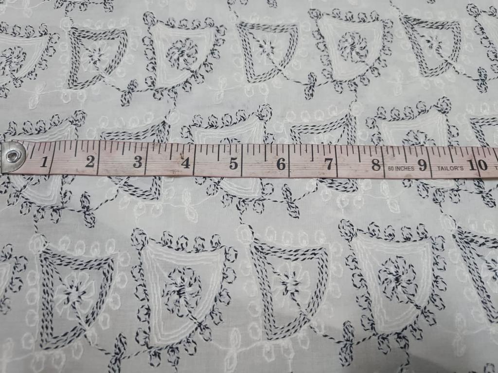 100 % Cotton Embroidered white and black fabric 58" wide.one single length 2 yards only