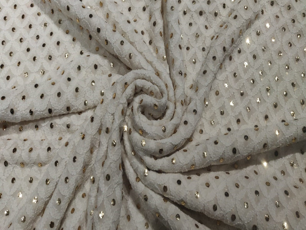 Lucknowi Fabric'. The beautiful embroidery on white